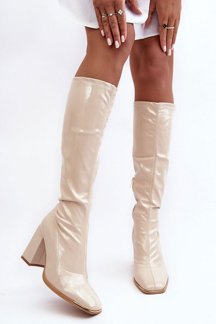 Boots with a glossy beige heel